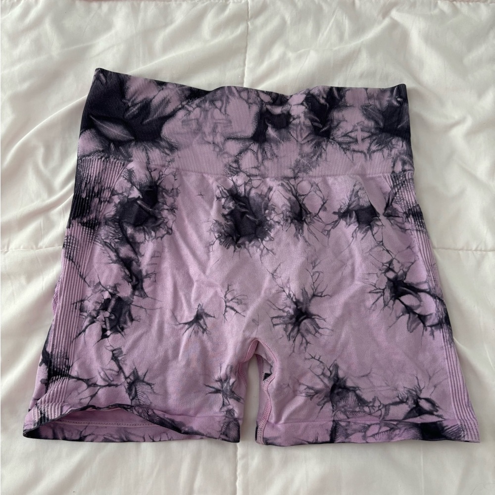 Tie dye black and purple shorts.